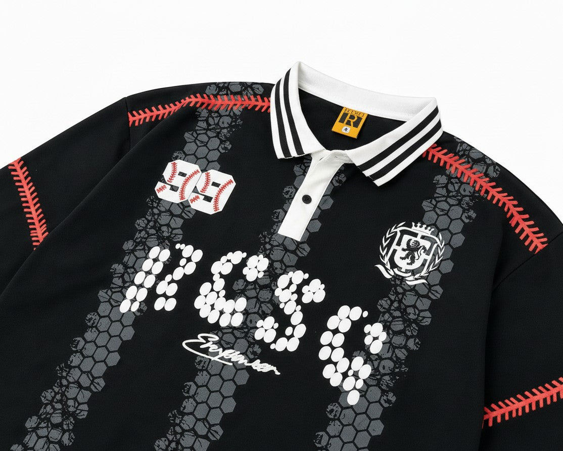 PAKSHI black long sleeve polo shirt with white collar, baseball stitch details, and graphic logo prints.