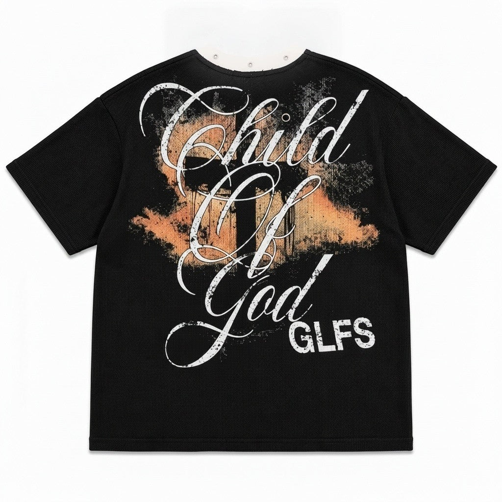 PAKSHI black waffle knit t-shirt featuring a white script graphic print with orange distressed background detail