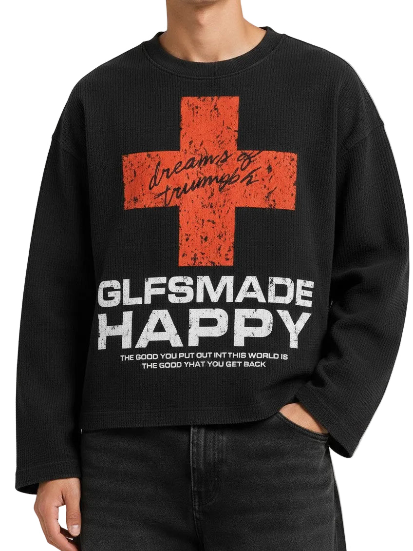 PAKSHI black waffle knit long-sleeve t-shirt with a distressed red cross graphic and white text on the chest.