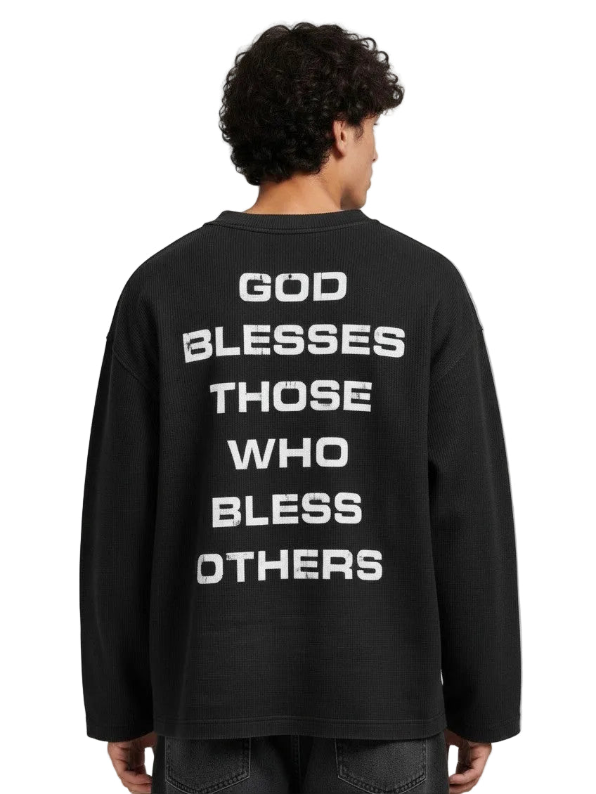 PAKSHI black waffle knit long-sleeve t-shirt with white distressed text print on the back