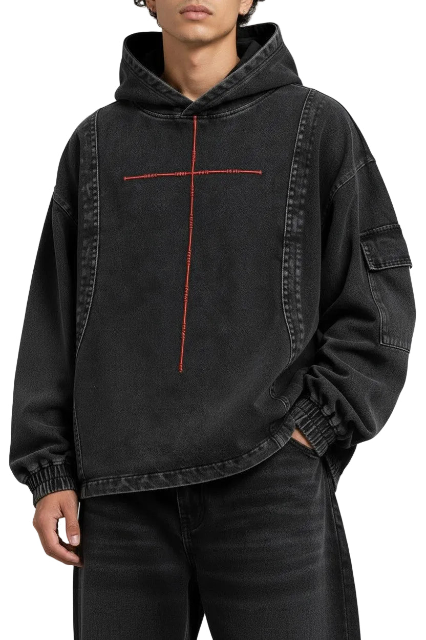 PAKSHI cropped utility denim hoodie in washed black with a red embroidered cross design and side sleeve pocket